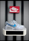 Grey futuristic low-top with bright blue side accents