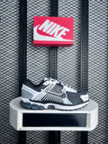 Open-mesh runner with caged overlays in slate and white