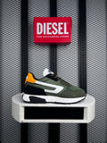 Matte nylon paneled trainer with bright orange heel