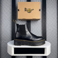 Platform Chelsea boot silhouette with yellow welt stitching