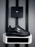 Graphic patch platform leather sneakers in black