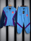 Zip-pocket paneled nylon tracksuit in sky blue