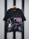 Washed black oversized tee with doodle and checkerboard prints