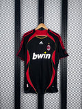 Curved red panel football jersey in black