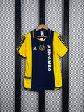 Short-sleeve collared football jersey in yellow and navy