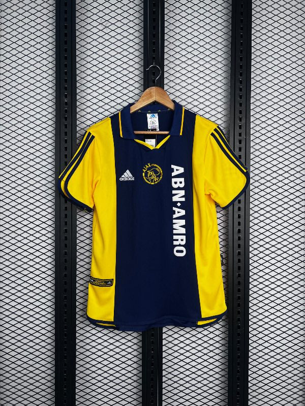 Short-sleeve collared football jersey in yellow and navy