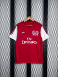 White-sleeved red football jersey with crest chest embroidery