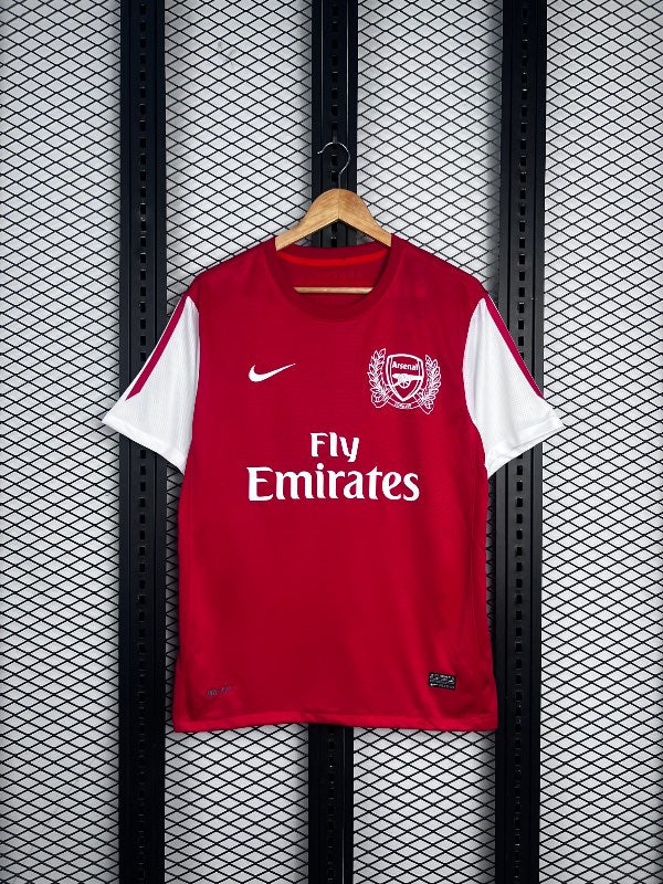 White-sleeved red football jersey with crest chest embroidery