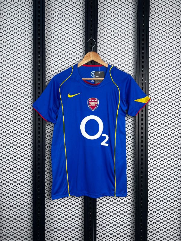 Yellow-piped short sleeve football jersey in cobalt blue