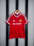 White-trimmed v-neck red jersey with shoulder stripes