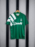 Glossy green football jersey with asymmetric shoulder stripes
