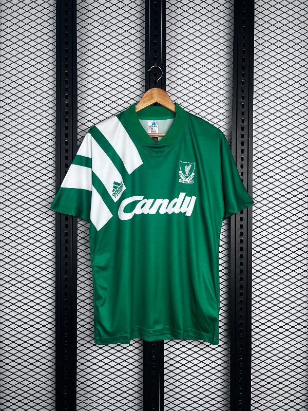 Glossy green football jersey with asymmetric shoulder stripes