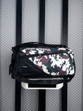 Asymmetric-zip canvas sports bag in woodland camo