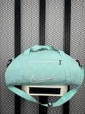 Embroidered-outline canvas duffel bag in mint green