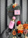 Pink swirl fragrance box with pastel illustration