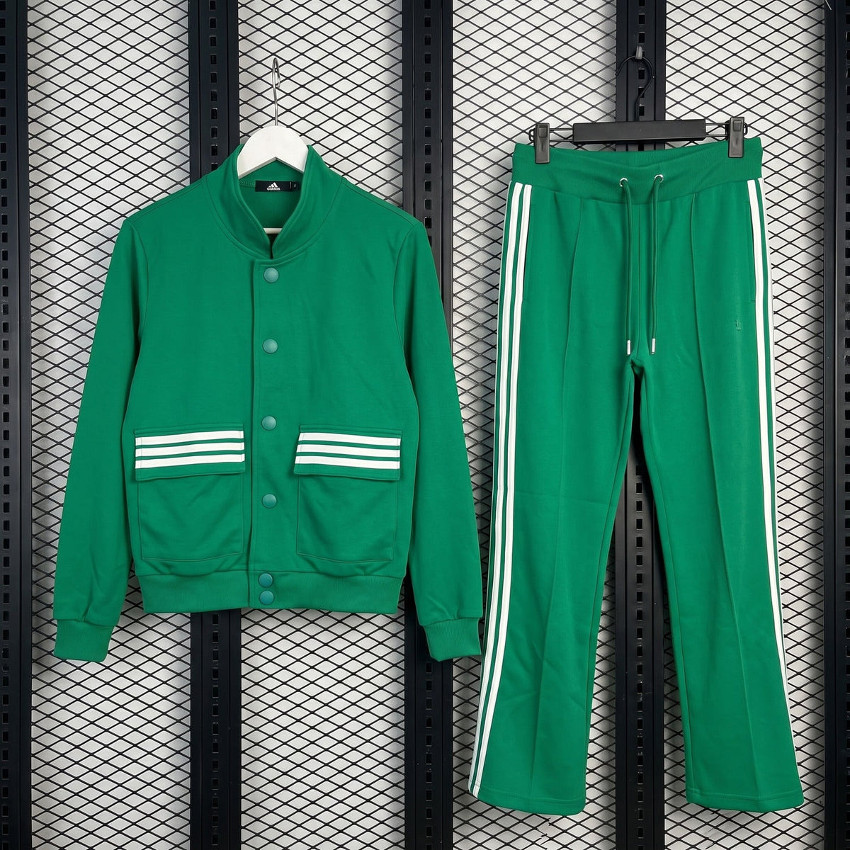 Three-stripe green track jacket and flared pant set