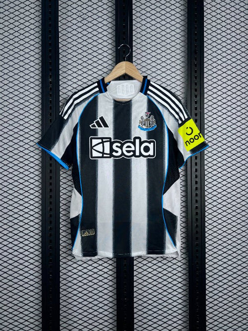 Black and white striped jersey with blue piping