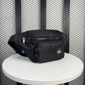 Black nylon belt bag with front zip pouch