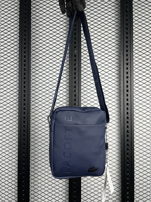 Vertical rectangular crossbody pouch in navy blue