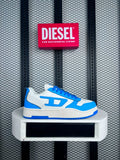 Bright blue and white panelled low-top trainer