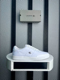 Textured leather low-top in white on a cup sole with a minimal finish