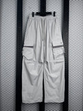 Matte lightweight cargo trousers with layered drawstring pockets
