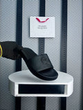Matte rubber slide in black on a platform sole