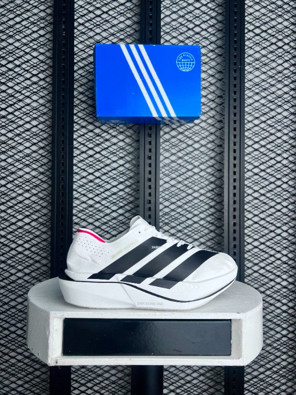 Thick-soled lightweight mesh runner in white and black