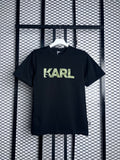 Soft-finish black cotton tee with green chest graphic