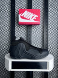 Matte black molded shell basketball trainer with zippered shroud