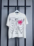 Skeleton ribcage and bleeding heart textured cream tee